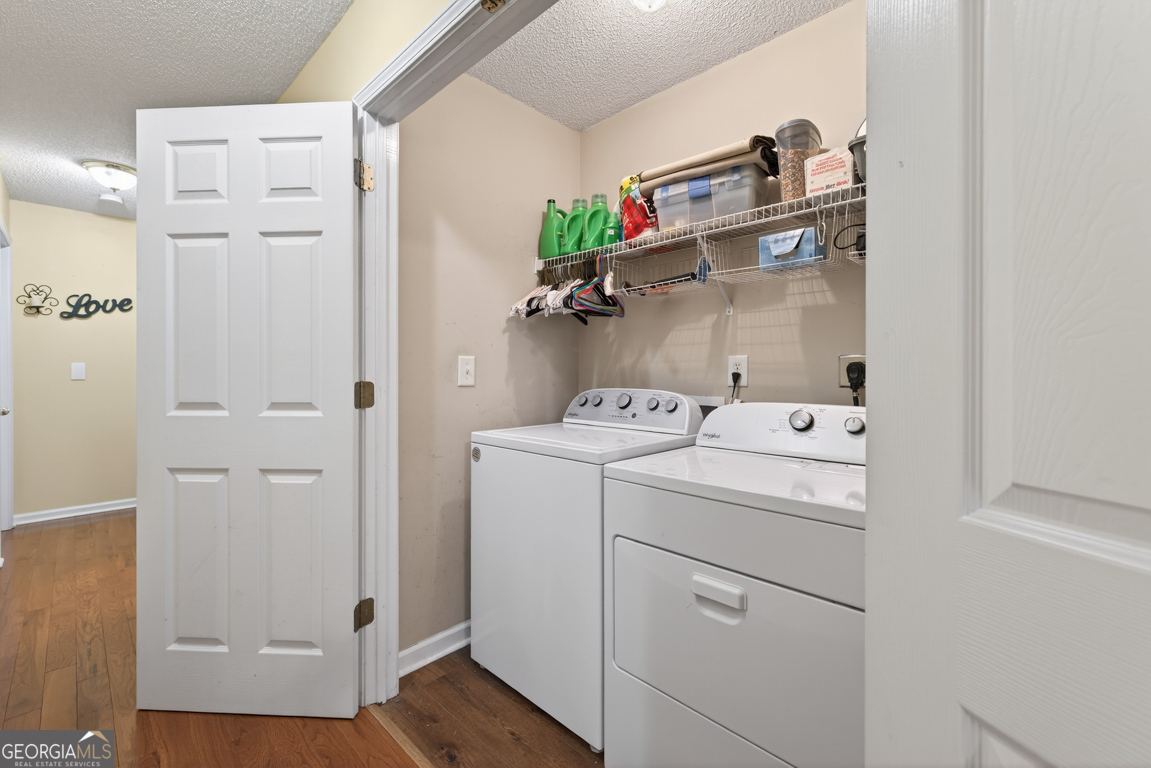 141 Pope Street Zebulon, GA 30295 - Photo 15 of 42 a utility room with dryer and washer