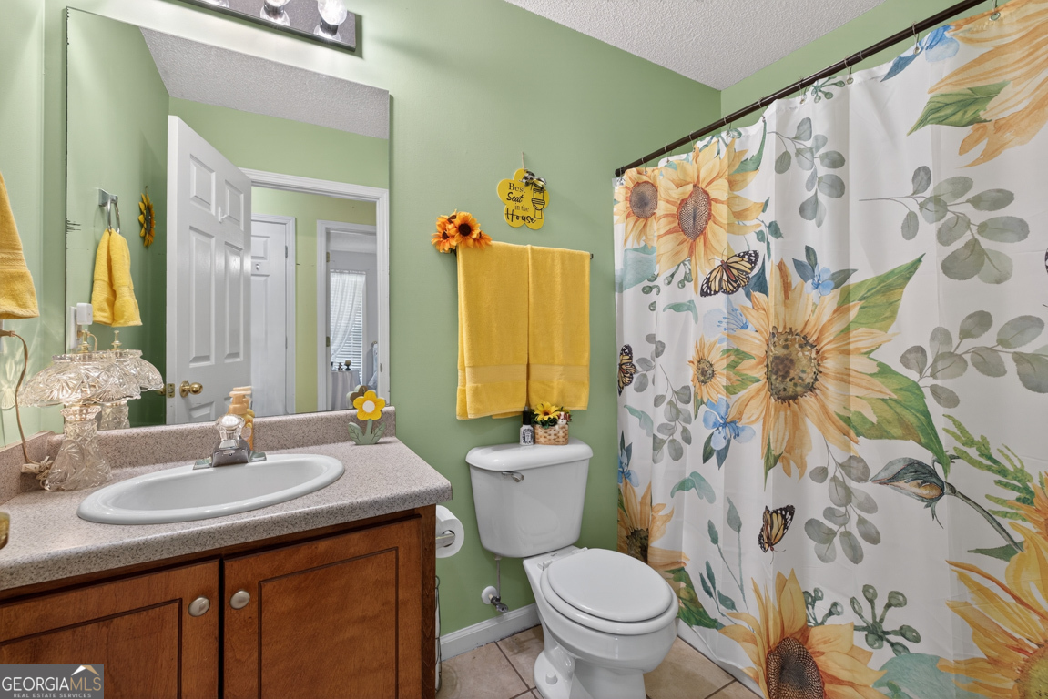 141 Pope Street Zebulon, GA 30295 - Photo 18 of 42 a bathroom with a sink and a mirror