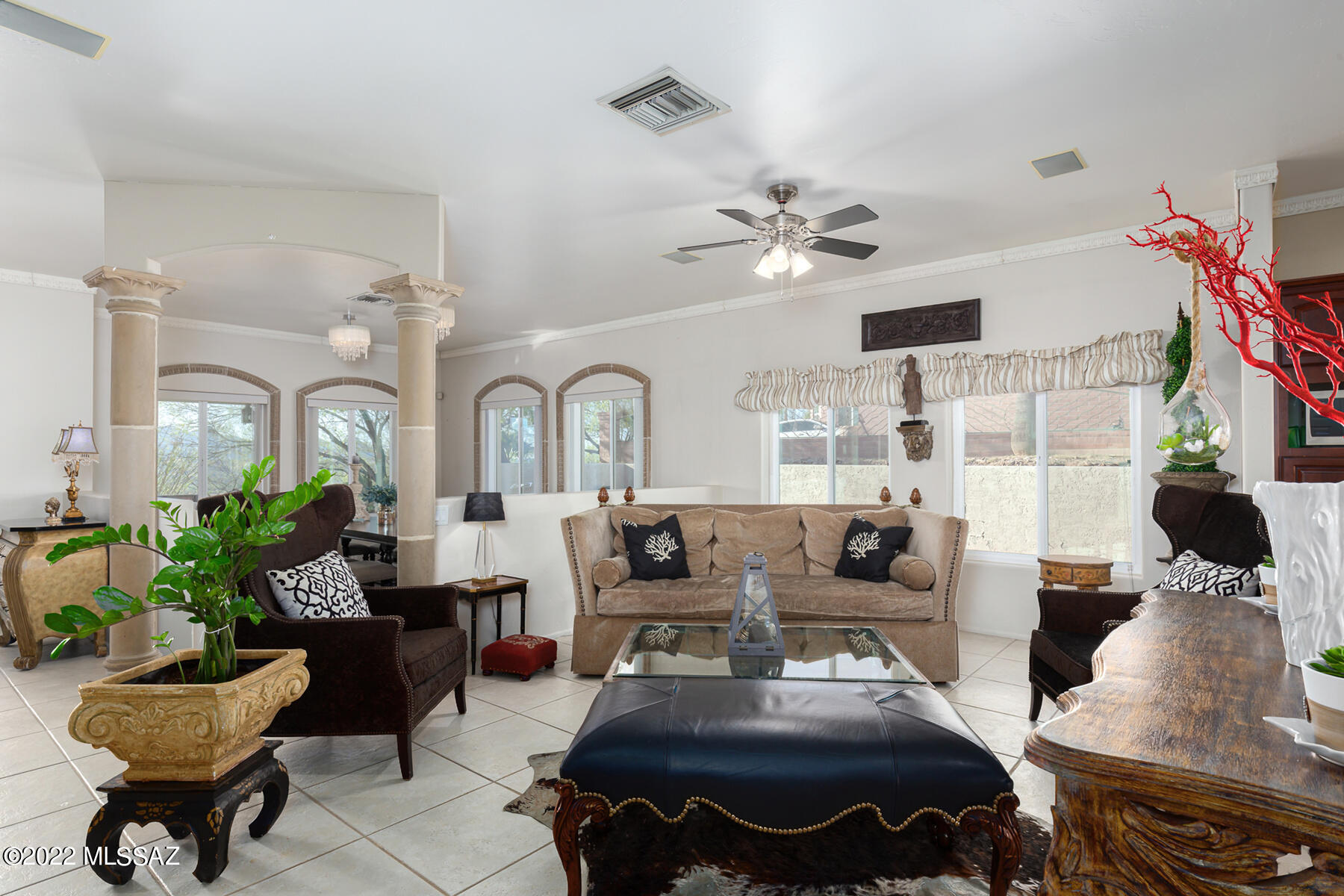 317 Valley View Drive Rio Rico, AZ 85648 - Photo 27 of 49 a living room with furniture and a chandelier