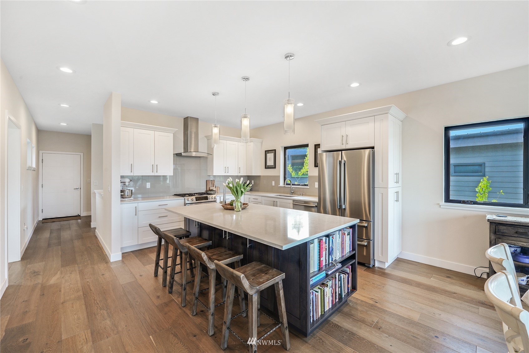 4920 Heather Drive Anacortes, WA 98221 - Photo 14 of 40 a large kitchen with a center island and a table