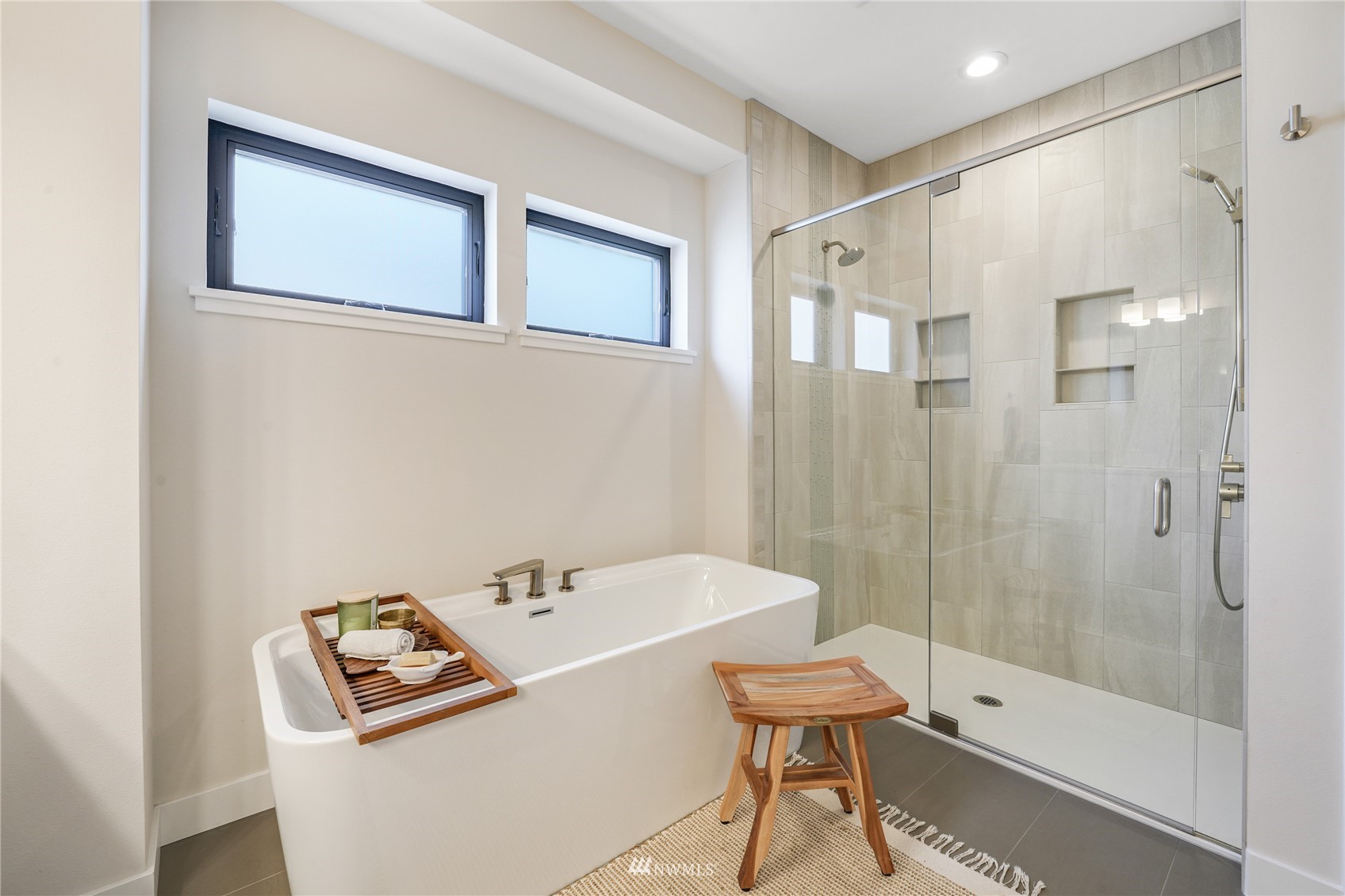 4920 Heather Drive Anacortes, WA 98221 - Photo 20 of 40 a bathroom with a bathtub a sink a toilet and a shower