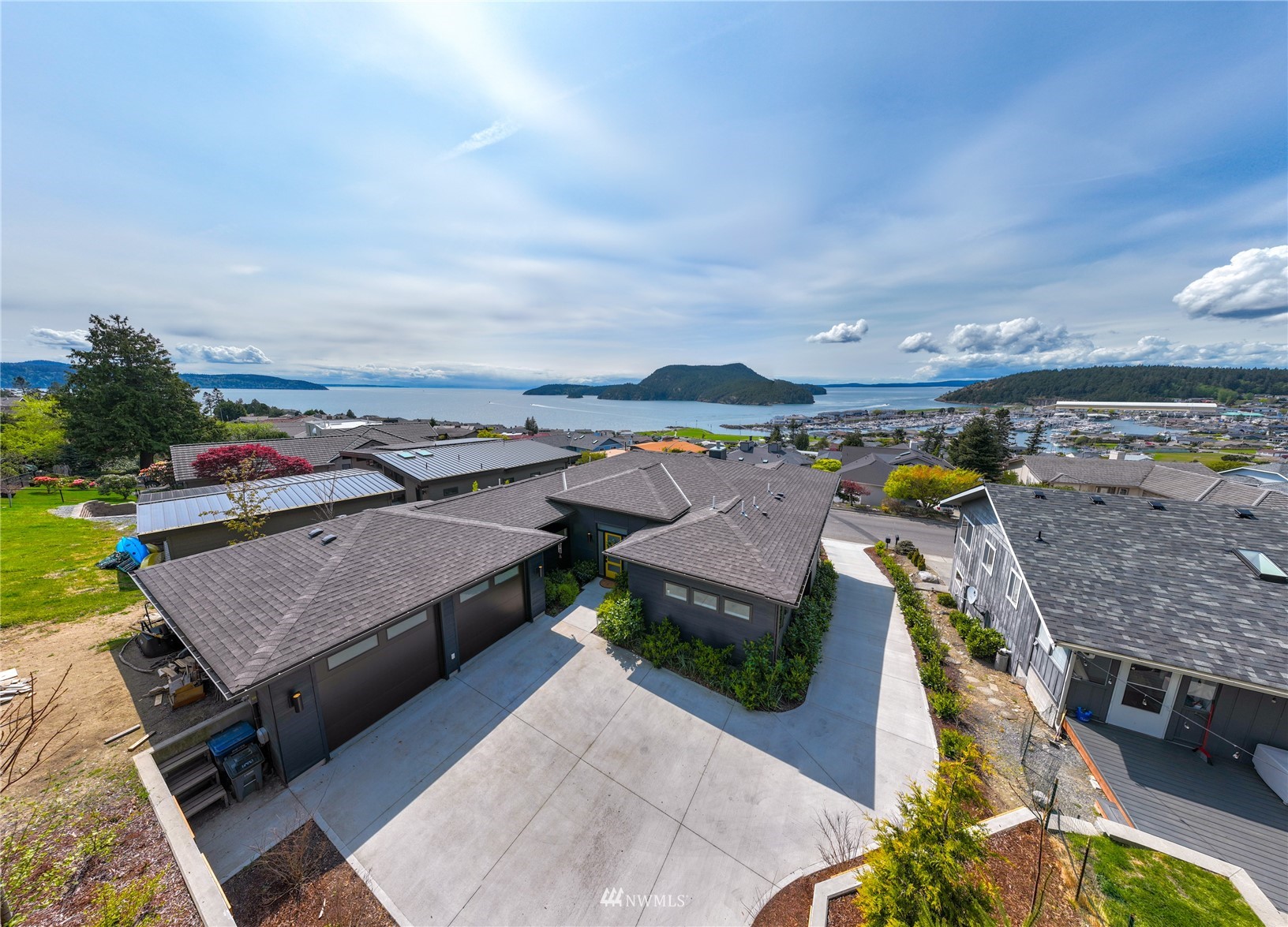 4920 Heather Drive Anacortes, WA 98221 - Photo 2 of 40 an aerial view of houses with outdoor space