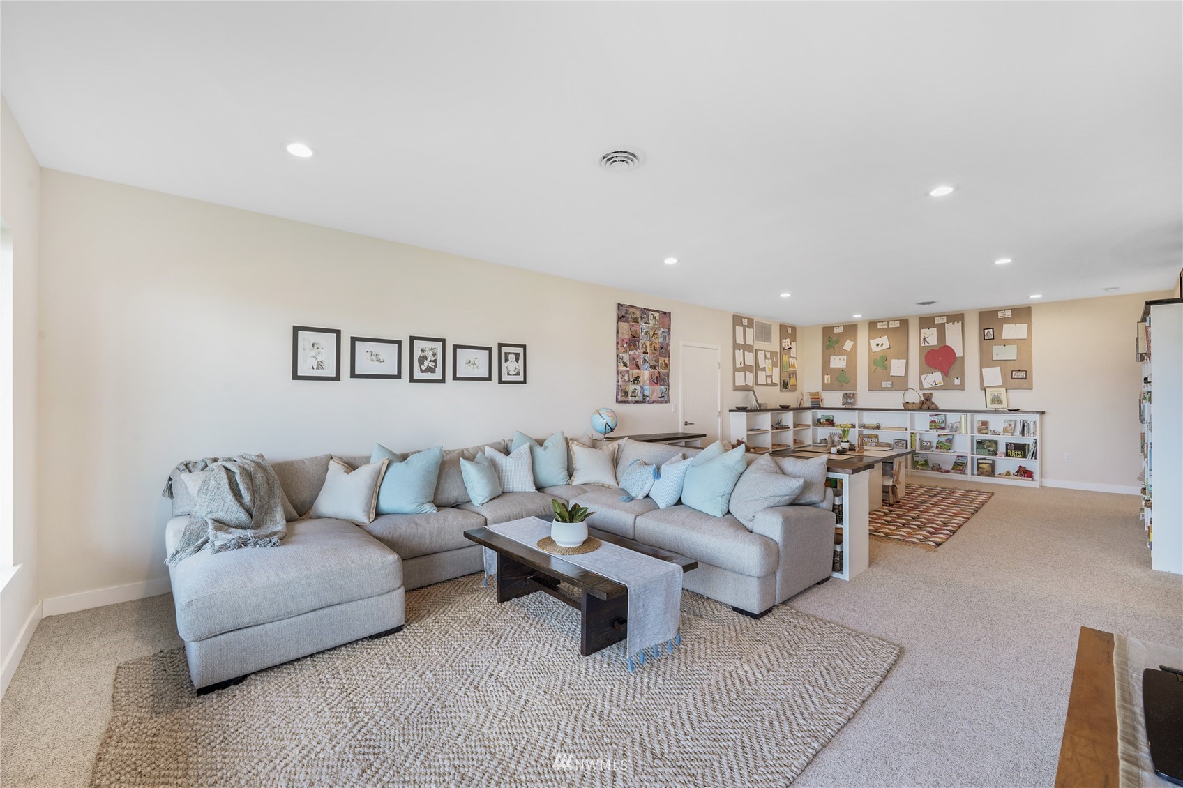 4920 Heather Drive Anacortes, WA 98221 - Photo 27 of 40 a living room with furniture and a couch