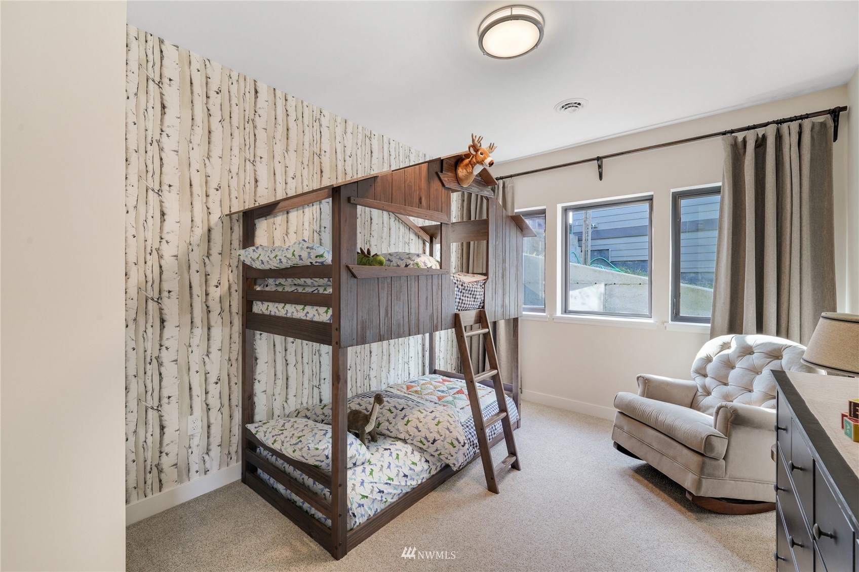 4920 Heather Drive Anacortes, WA 98221 - Photo 30 of 40 a bedroom with furniture and a window