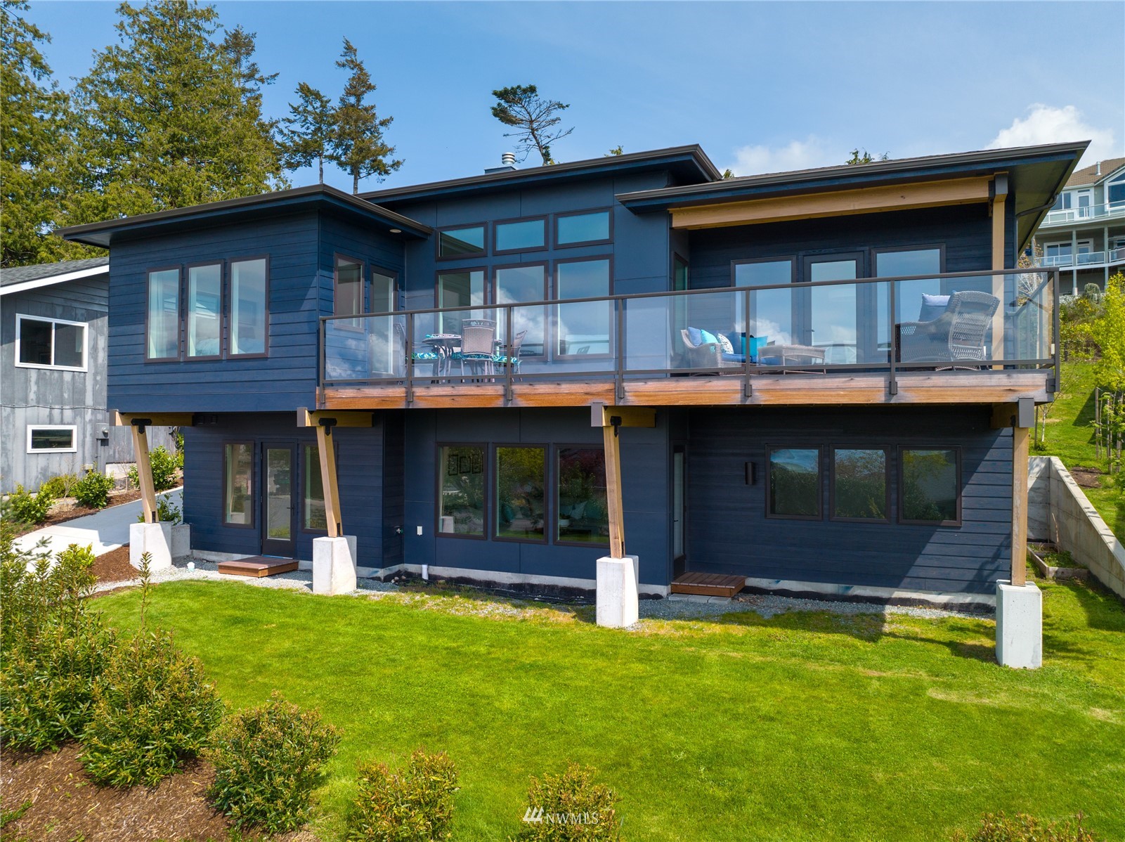4920 Heather Drive Anacortes, WA 98221 - Photo 39 of 40 a front view of a house with garden