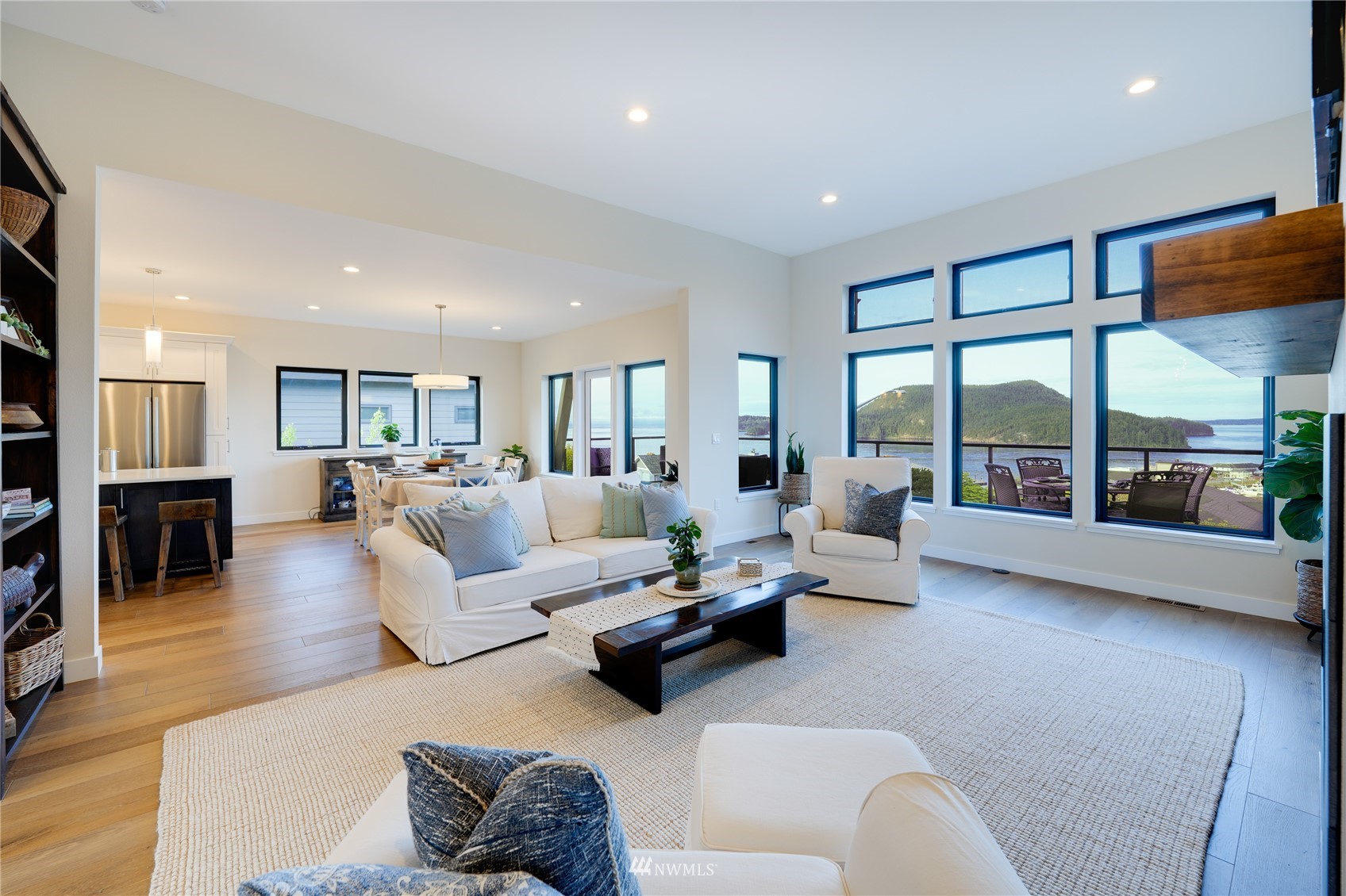 4920 Heather Drive Anacortes, WA 98221 - Photo 7 of 40 a living room with furniture and a large window