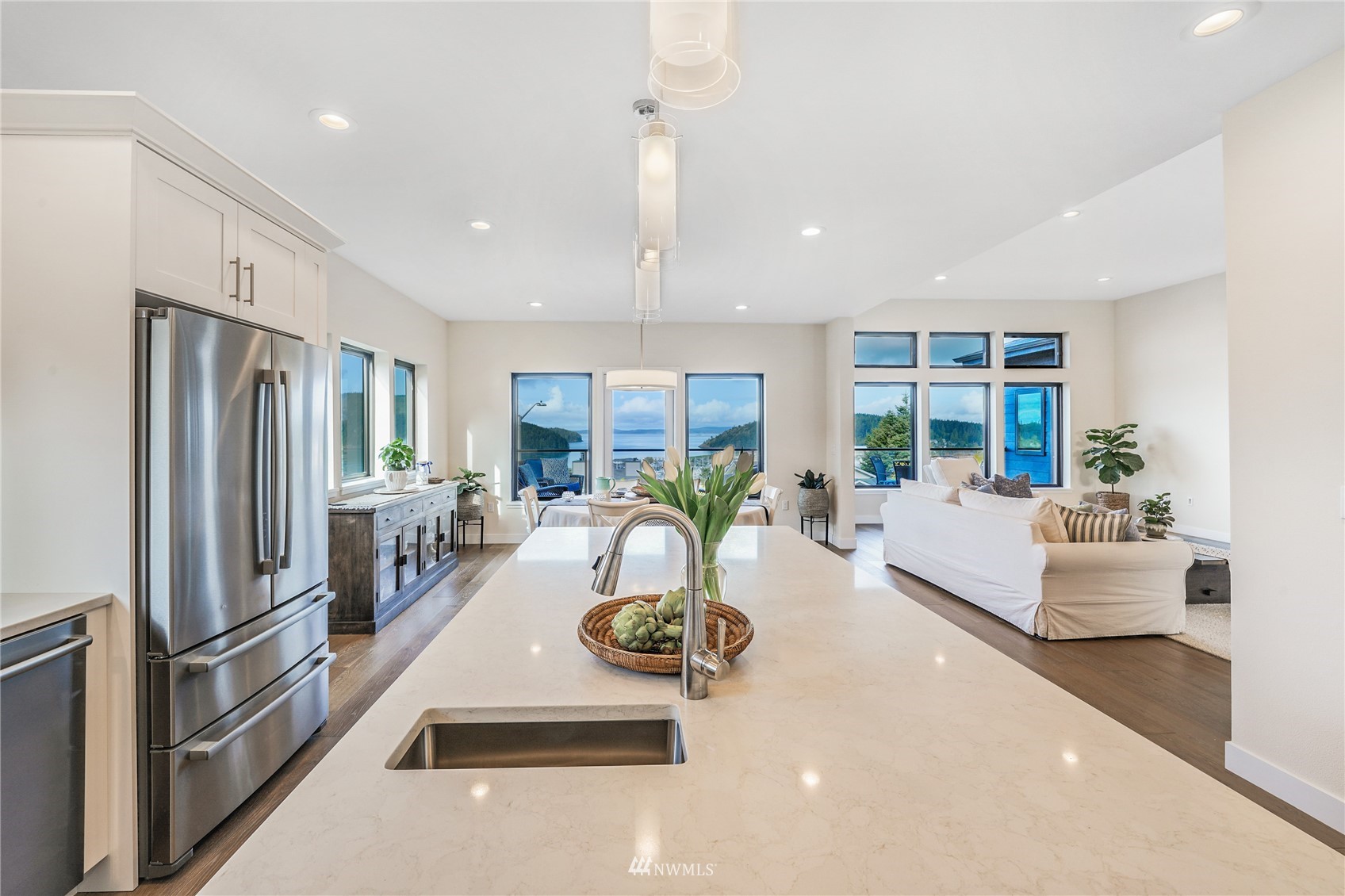 4920 Heather Drive Anacortes, WA 98221 - Photo 10 of 40 a view of a living room kitchen and dining room