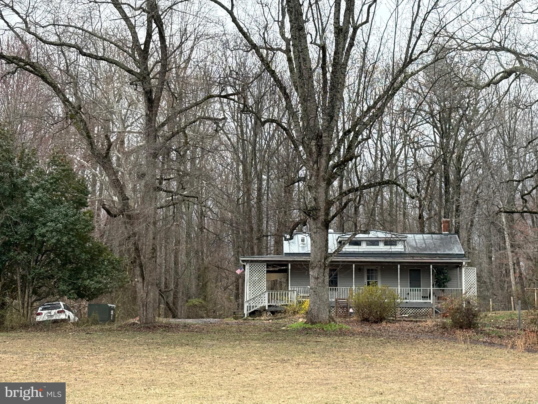 1907 Mountain View Road Stafford, VA 22554 - Photo 3 of 6 a front view of a house with a garden