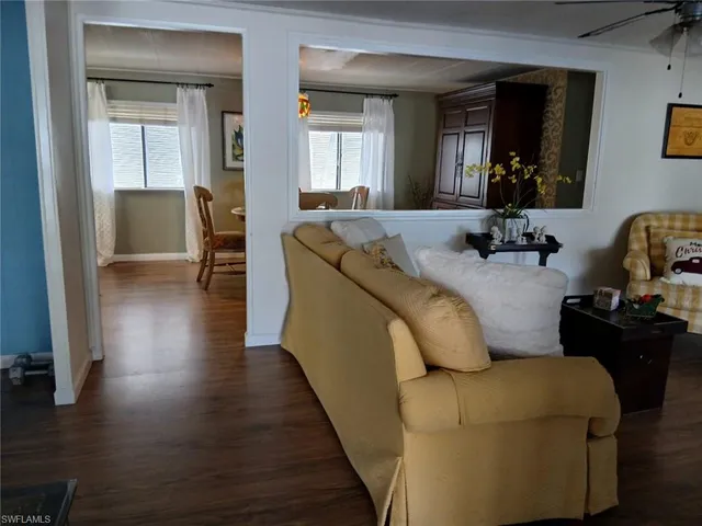 a room with furniture and wooden floor