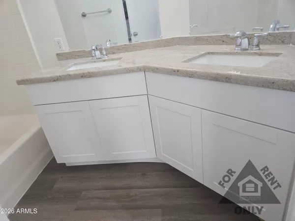 a bathroom with a sink and a vanity