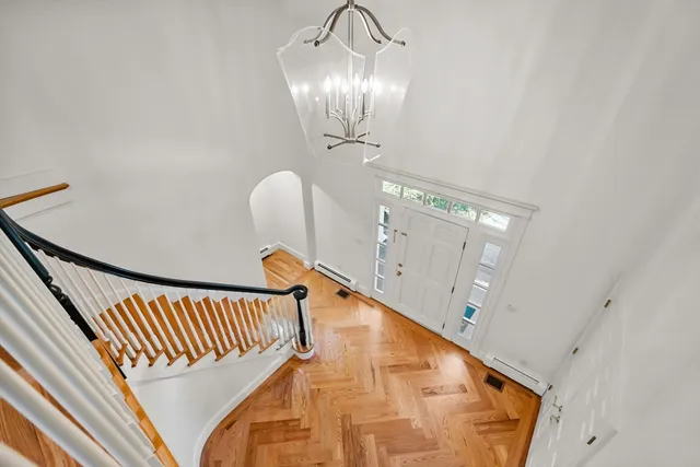 a view of a balcony wooden floor and stairs
