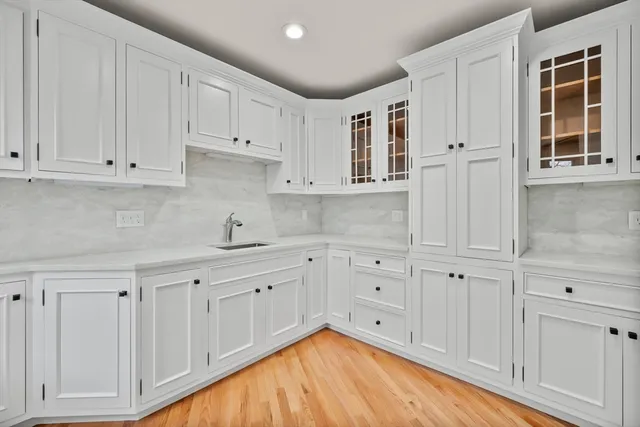 a view of cabinets and window