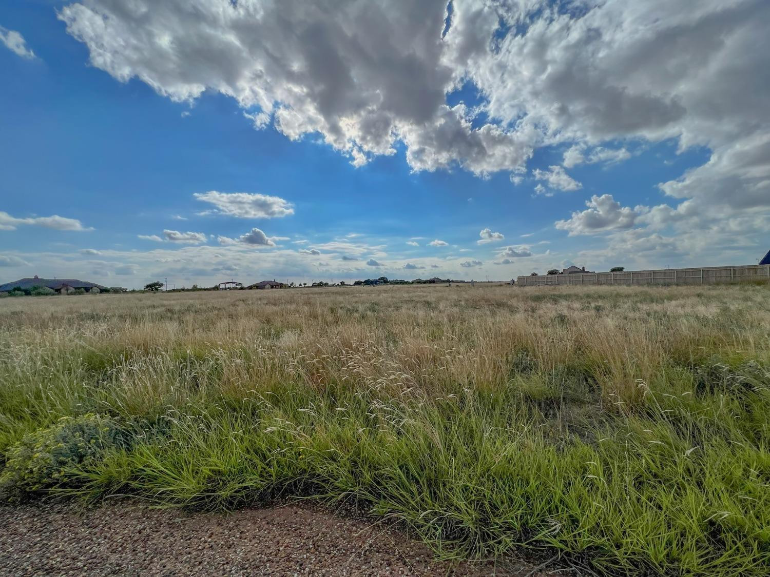 6787 Trump Court Ropesville, TX 79358 - Photo 7 of 7 a view of a lake from a yard