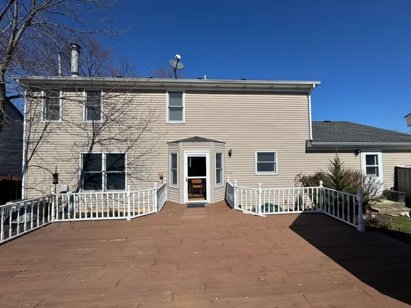 a front view of a house with a balcony