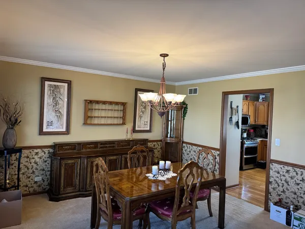 a view of a dining room with furniture