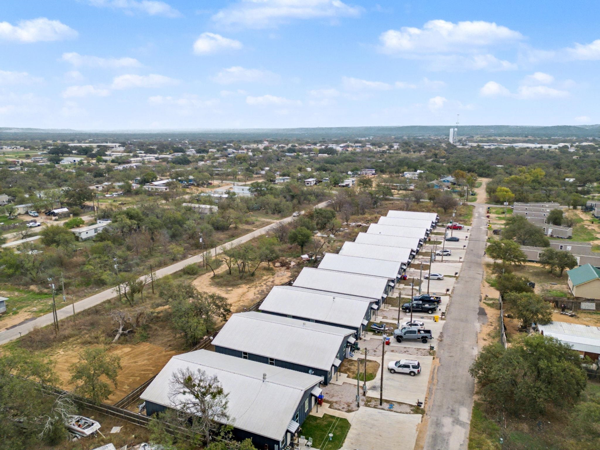 870 Waco Street Kingsland, TX 78639 - Photo 27 of 30 an aerial view of a city with lots of residential buildings