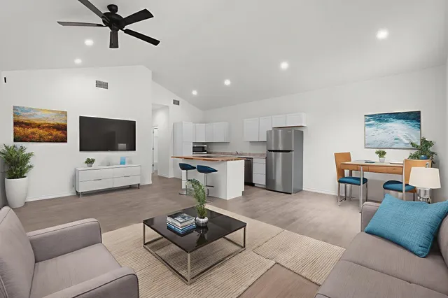 a view of kitchen with stainless steel appliances refrigerator oven and stove