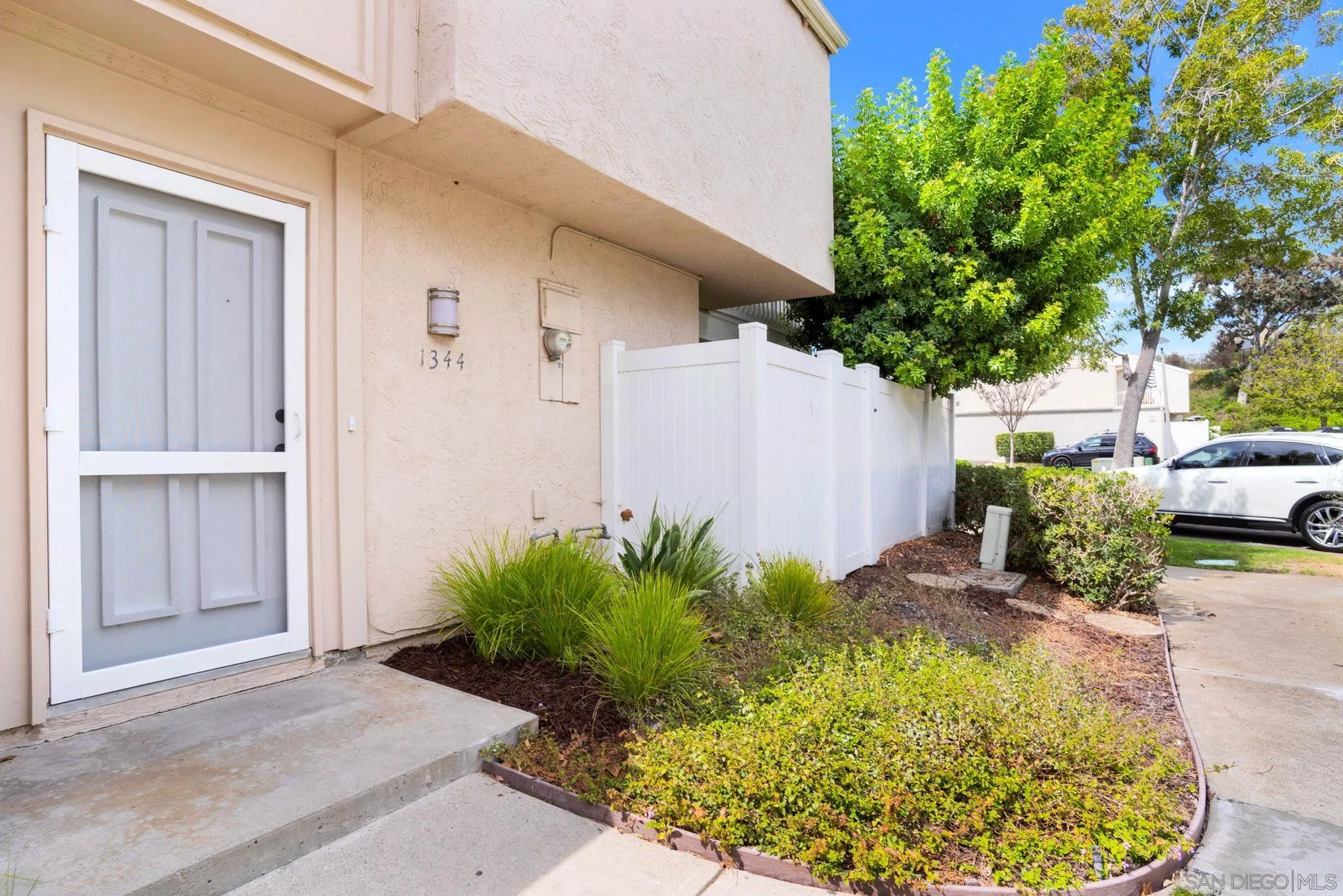 1344 Caminito Septimo Cardiff, CA 92007 - Photo 2 of 10 a backyard of a house with lots of green space