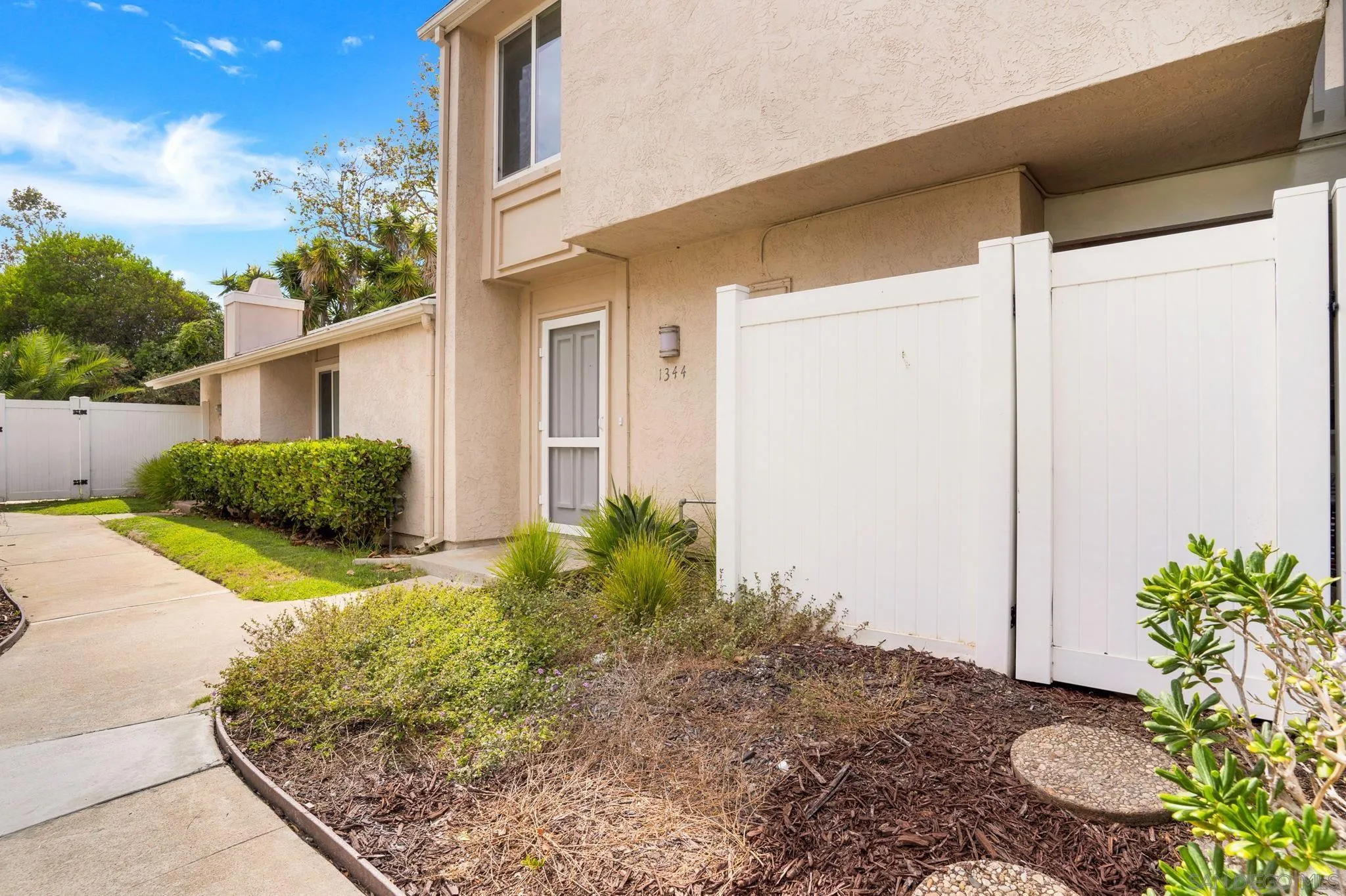 1344 Caminito Septimo Cardiff, CA 92007 - Photo 3 of 10 a view of a house with backyard and garden