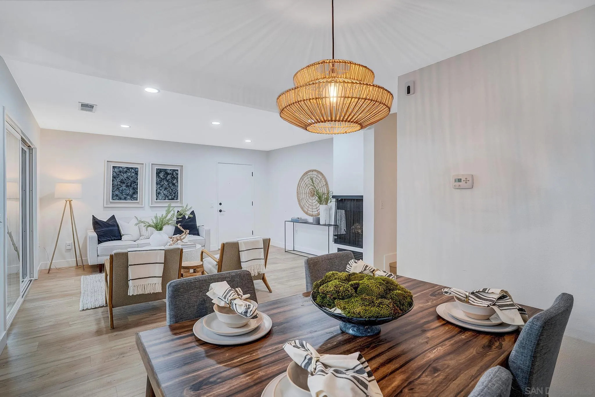 1344 Caminito Septimo Cardiff, CA 92007 - Photo 9 of 10 a view of a dining room with furniture wooden floor and chandelier