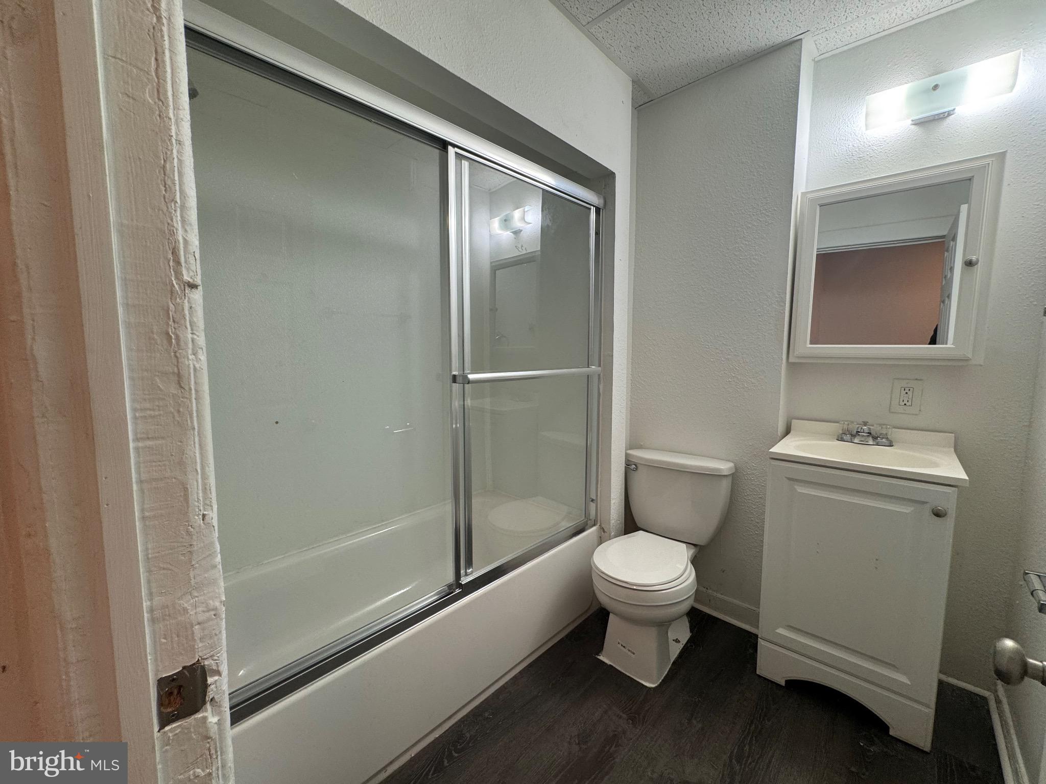 2012 Cliftwood Avenue Baltimore, MD 21213 - Photo 14 of 25 a bathroom with a toilet and a sink