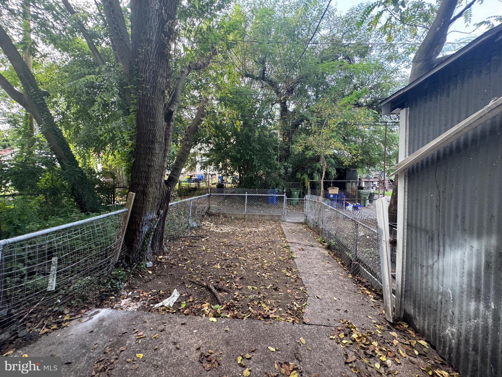 2012 Cliftwood Avenue Baltimore, MD 21213 - Photo 24 of 25 a backyard of a house with lots of green space