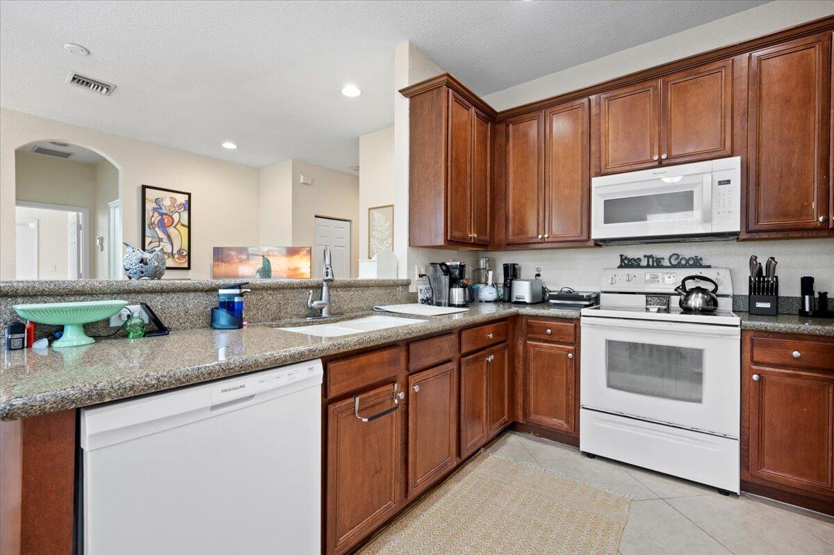 135 Seagrape Drive, Unit 202 Jupiter, FL 33458 - Photo 8 of 25 Kitchen