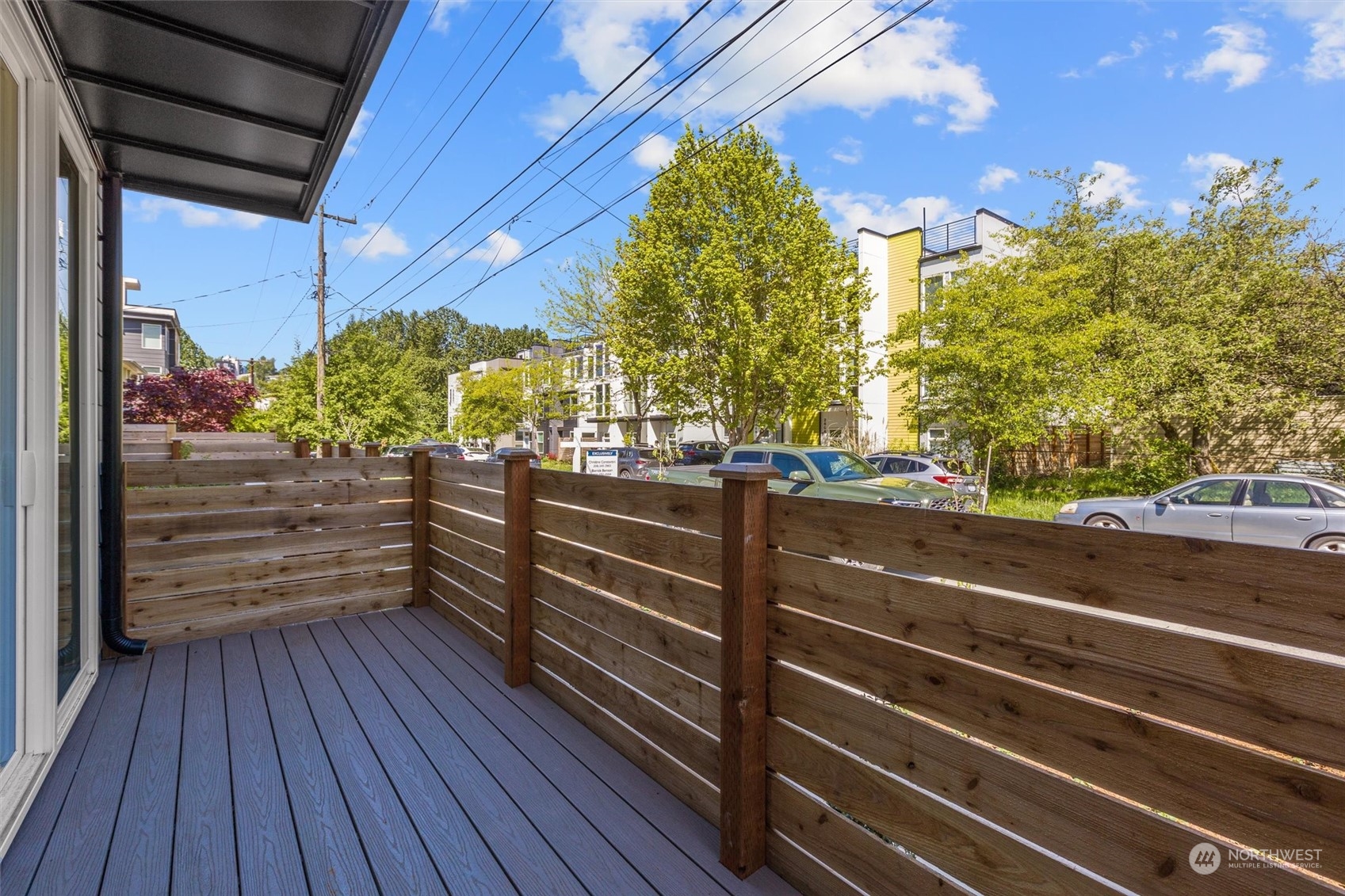 2605 Southwest Nevada Street Seattle, WA 98126 - Photo 14 of 24 a view of a balcony with wooden floor
