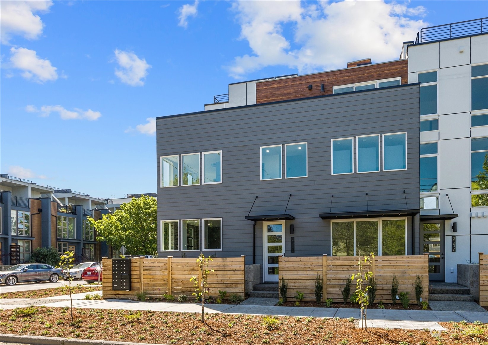 2605 Southwest Nevada Street Seattle, WA 98126 - Photo 2 of 24 a front view of a house with a yard