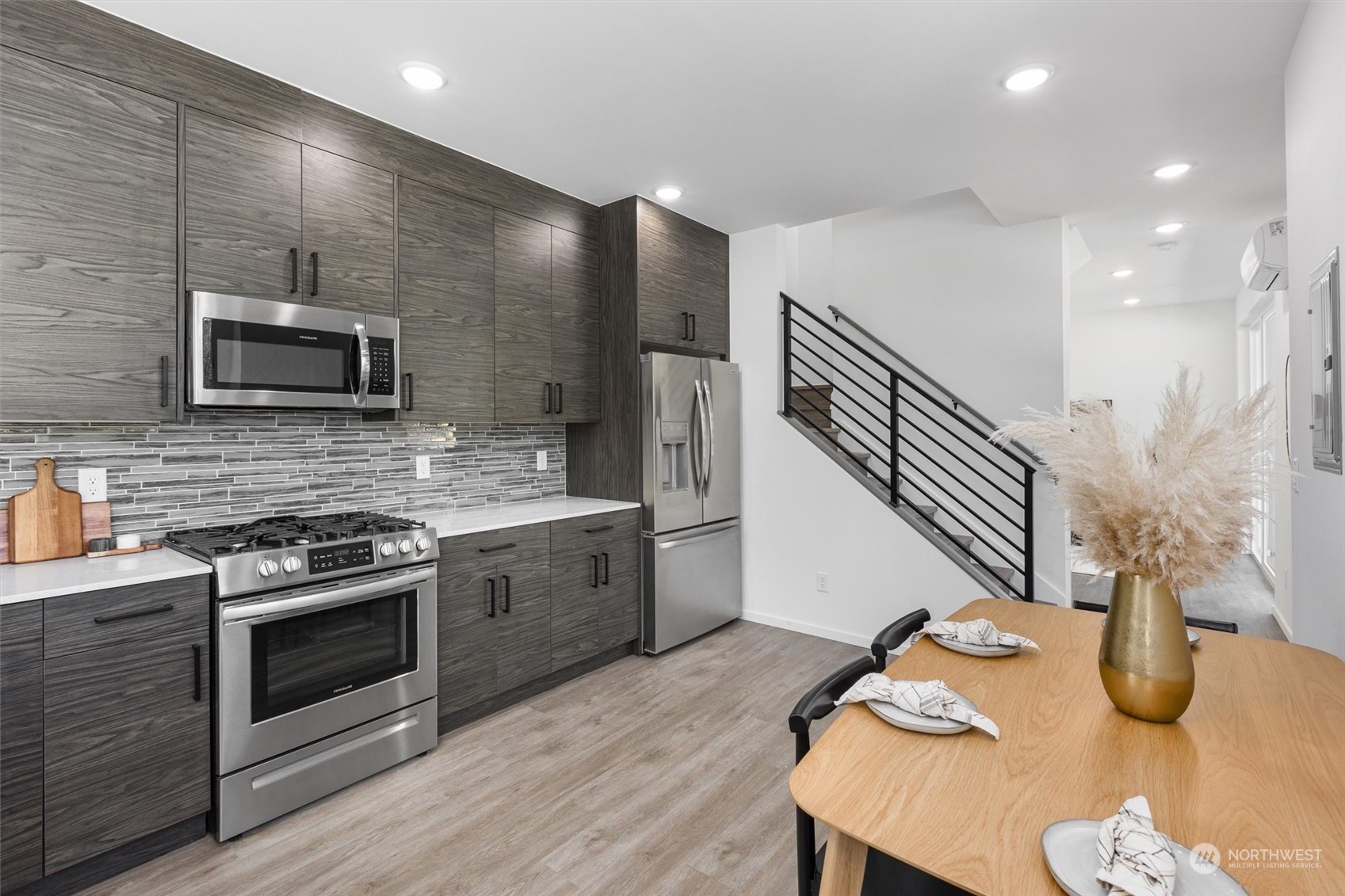 2605 Southwest Nevada Street Seattle, WA 98126 - Photo 6 of 24 a kitchen with sink stove microwave and refrigerator