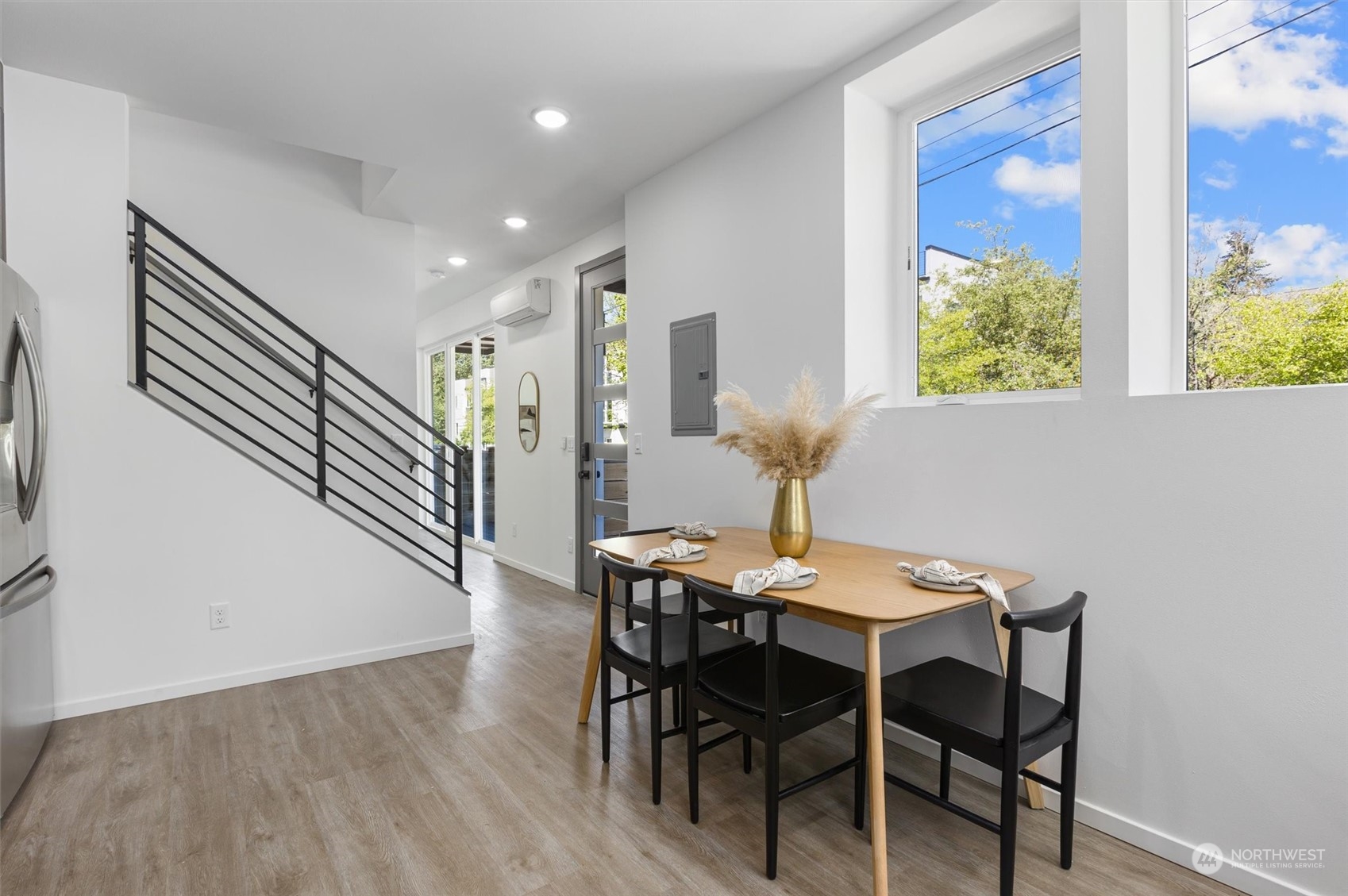 2605 Southwest Nevada Street Seattle, WA 98126 - Photo 7 of 24 a view of a dining room with furniture and a window