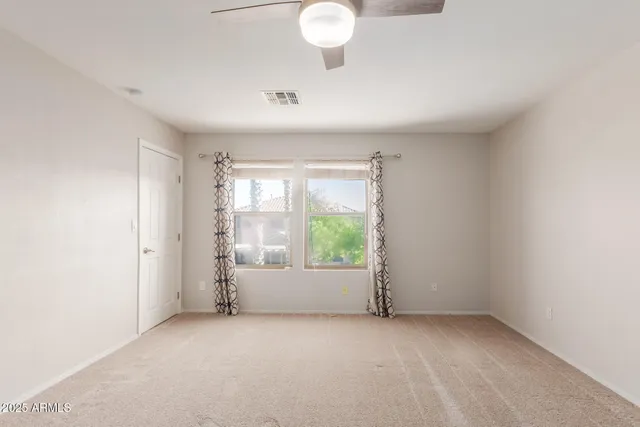 an empty room with windows