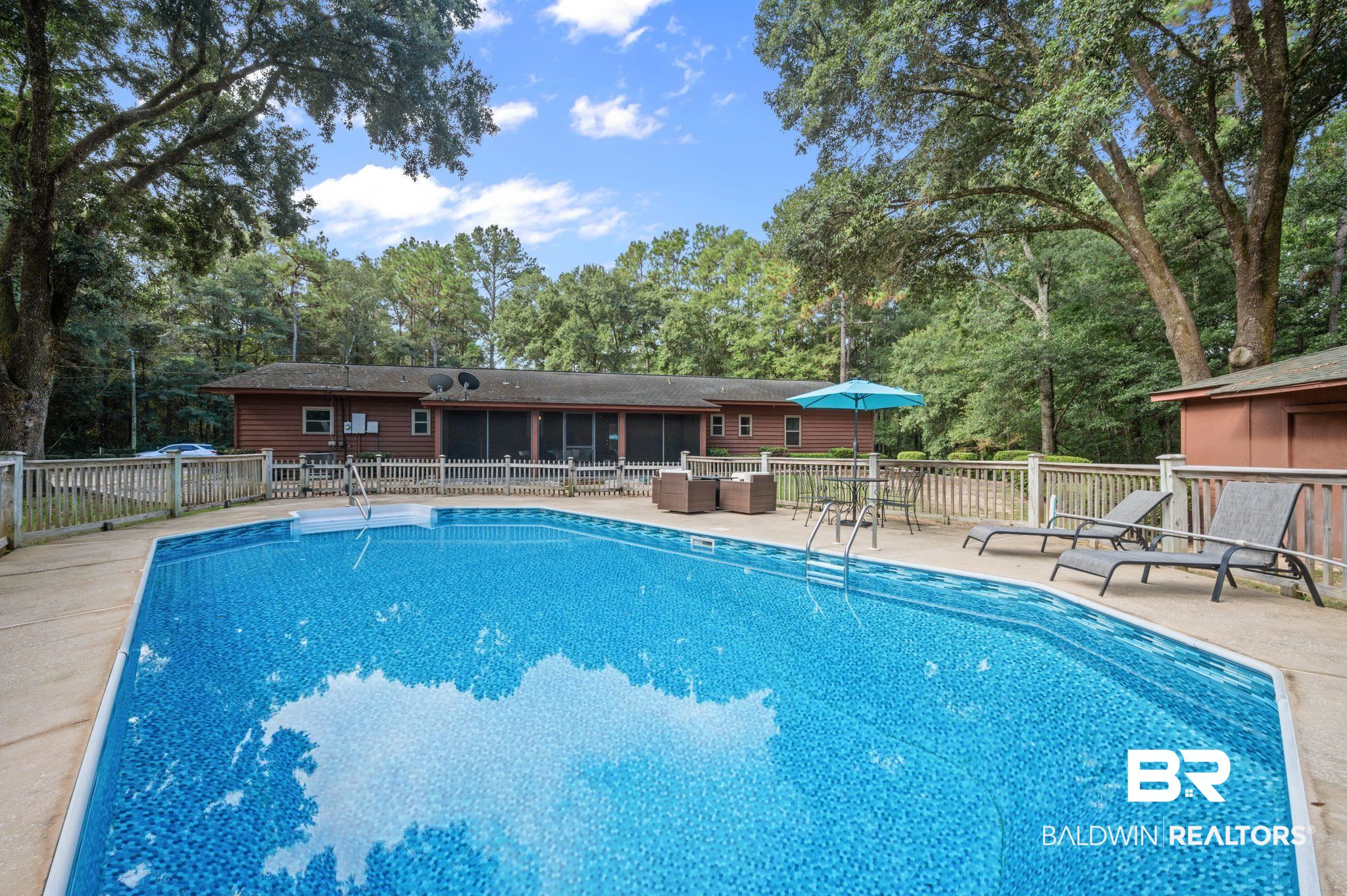 4566 McCrary Road, Unit A Semmes, AL 36575 - Photo 24 of 28 View of swimming pool with a patio area