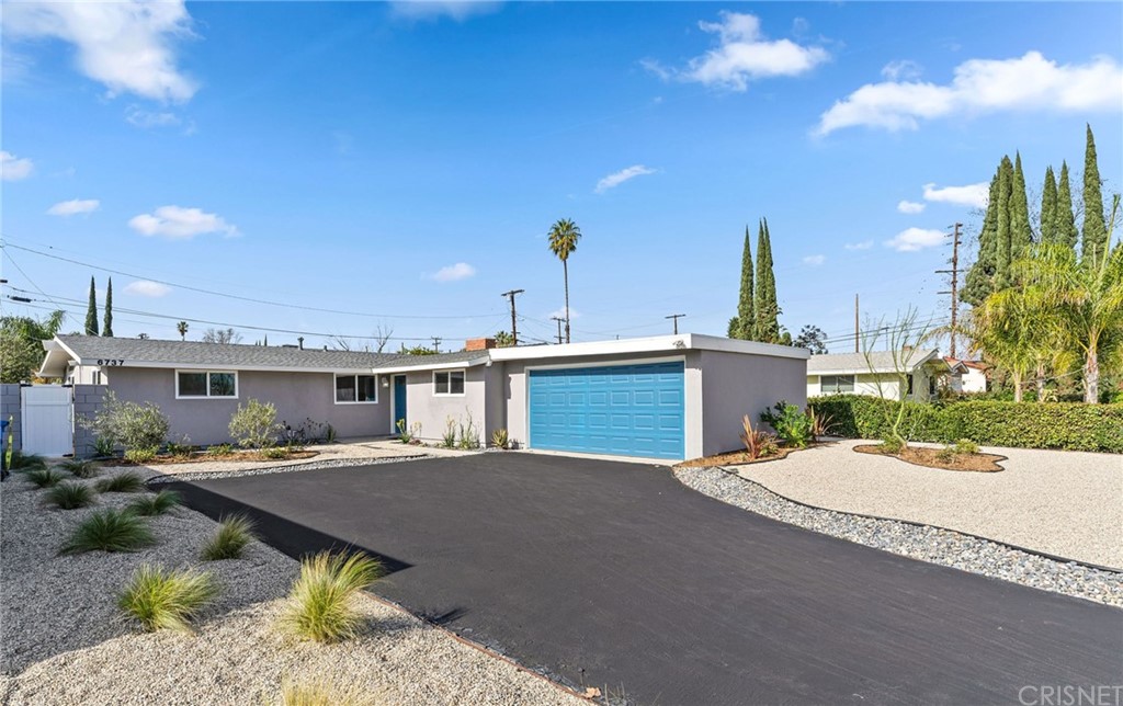 a view of a house with a patio