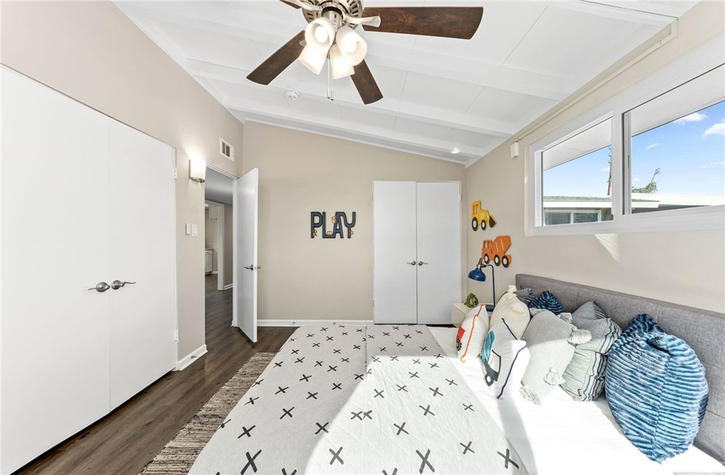 6737 Delco Avenue Winnetka, CA 91306 - Photo 22 of 31 a bedroom with a bed and a window