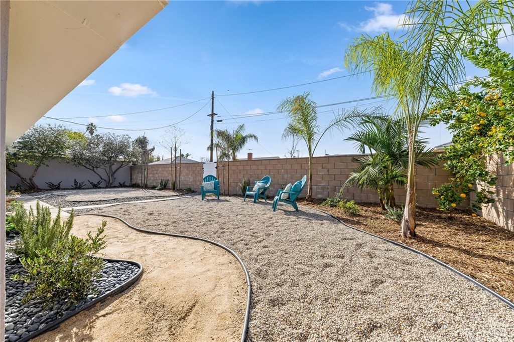 6737 Delco Avenue Winnetka, CA 91306 - Photo 28 of 31 a view of a backyard with a fountain