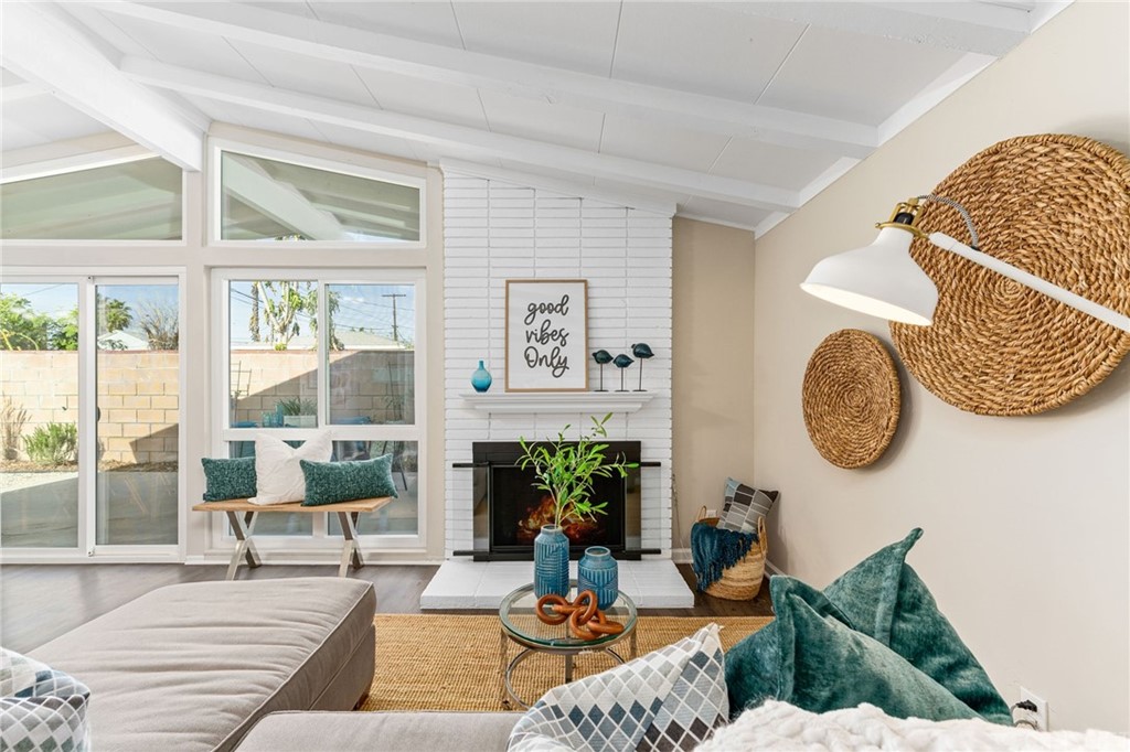 6737 Delco Avenue Winnetka, CA 91306 - Photo 4 of 31 a living room with furniture and a large window