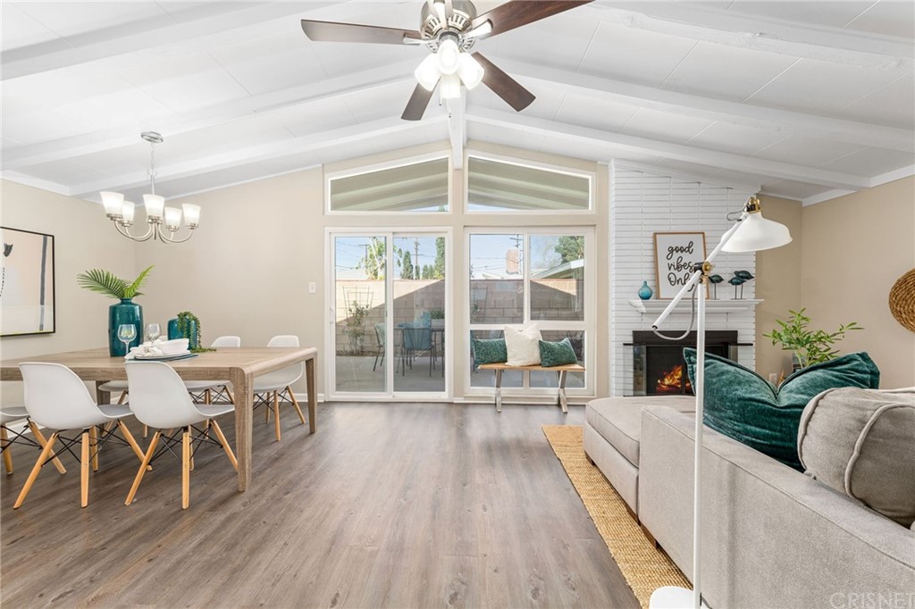6737 Delco Avenue Winnetka, CA 91306 - Photo 6 of 31 a living room with furniture and a large window