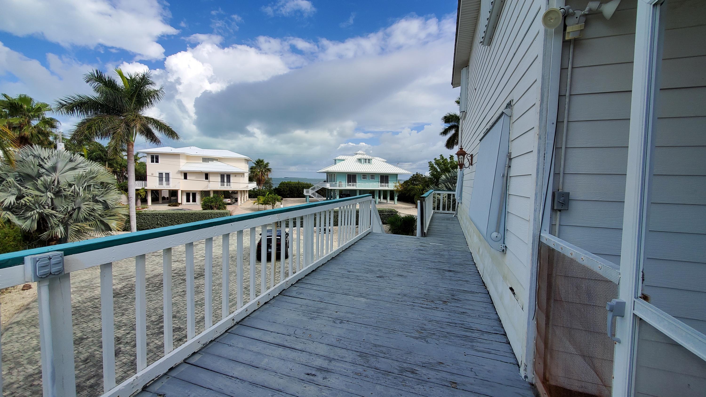 66 Mutiny Place Key Largo, FL 33037 - Photo 8 of 29 Side porch