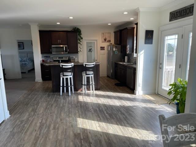 16444 Angelus Road Jefferson, SC 29718 - Photo 8 of 34 a kitchen with stainless steel appliances granite countertop a refrigerator a stove top oven a sink and cabinets