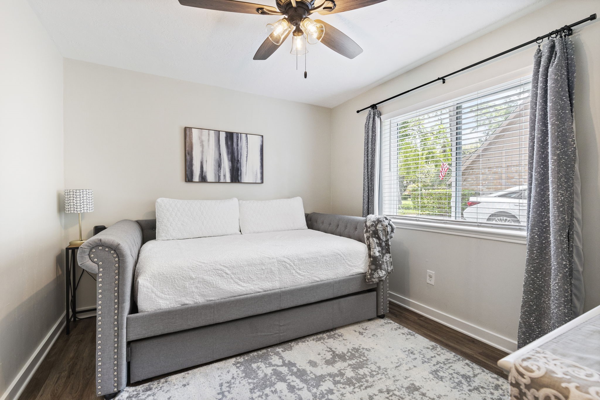 623 Hickory Ridge Drive Shenandoah, TX 77381 - Photo 25 of 26 a bedroom with a bed and window
