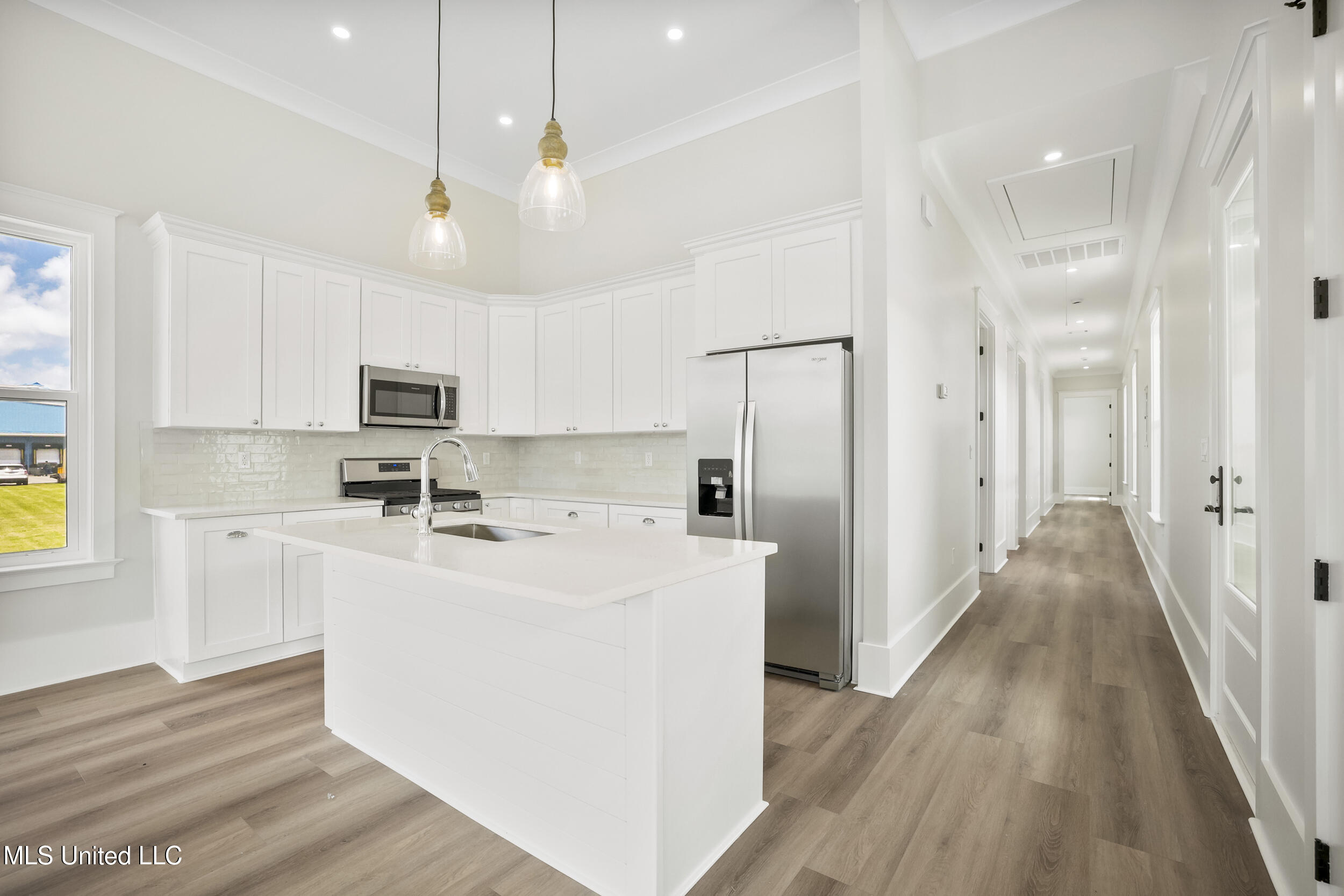 254 Caillavet Street Biloxi, MS 39530 - Photo 11 of 42 KITCHEN BREAKFAST BAR