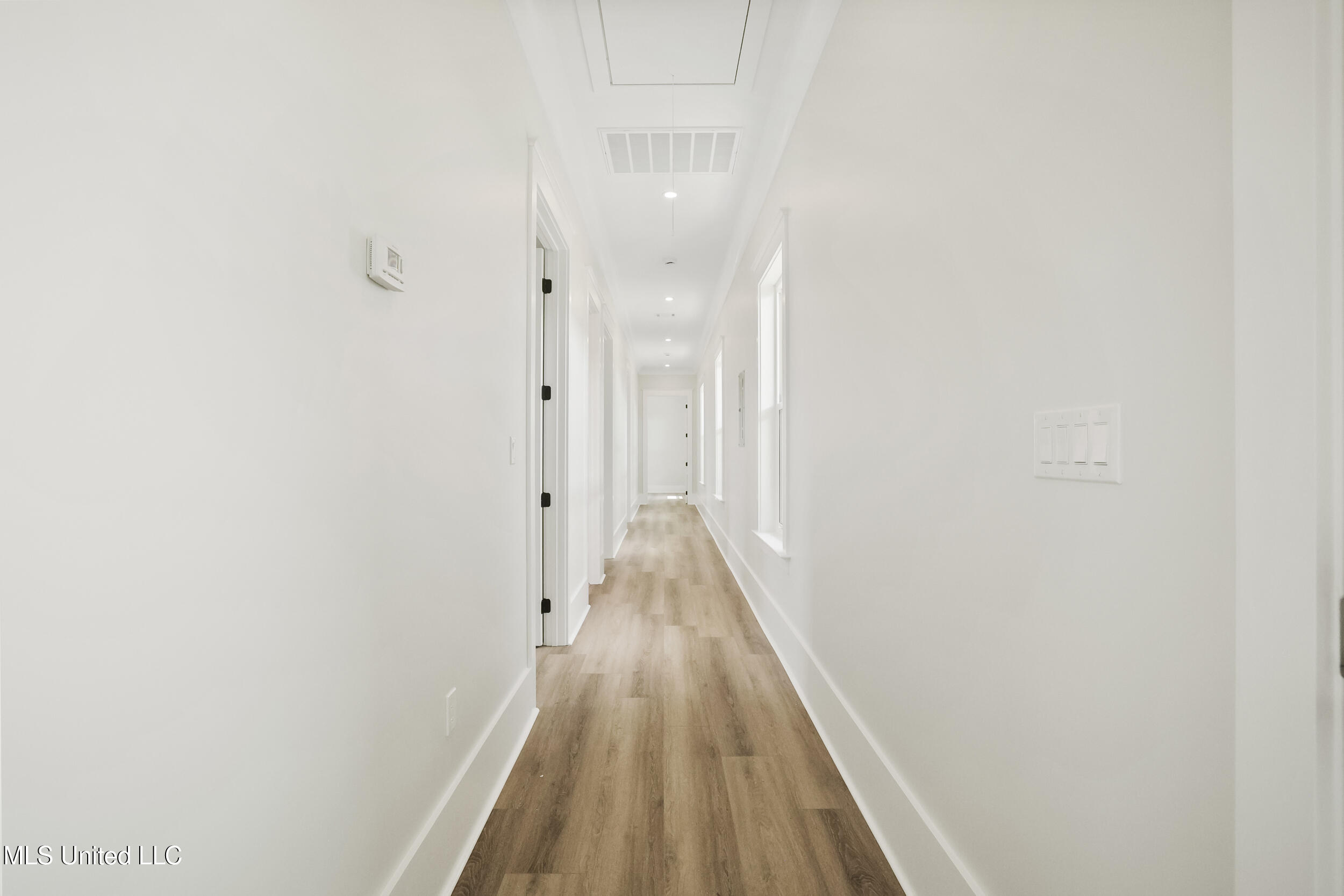 254 Caillavet Street Biloxi, MS 39530 - Photo 13 of 42 HALL TO BEDS AND BATHS