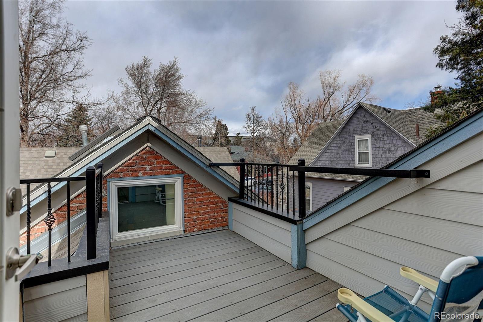1902 Grove Street Boulder, CO 80302 - Photo 1 of 38 a view of outdoor space and deck