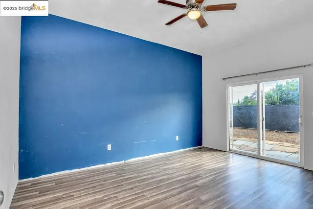 a view of a roadside with trees