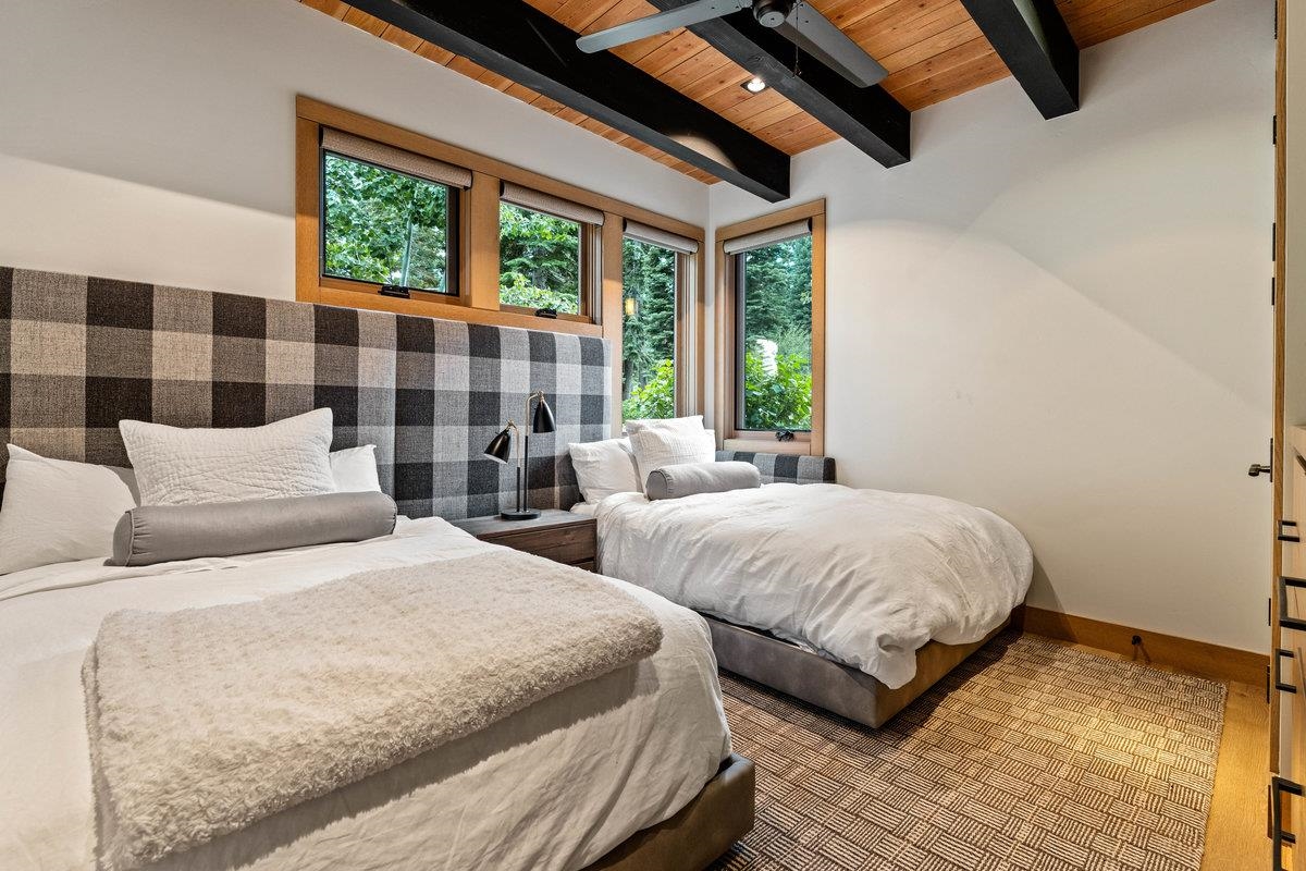 8370 Valhalla Drive Truckee, CA 96161 - Photo 12 of 21 a bedroom with double bed and a large window