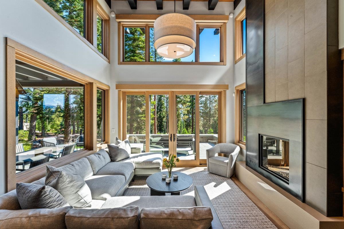 8370 Valhalla Drive Truckee, CA 96161 - Photo 5 of 21 a living room with furniture and a fireplace
