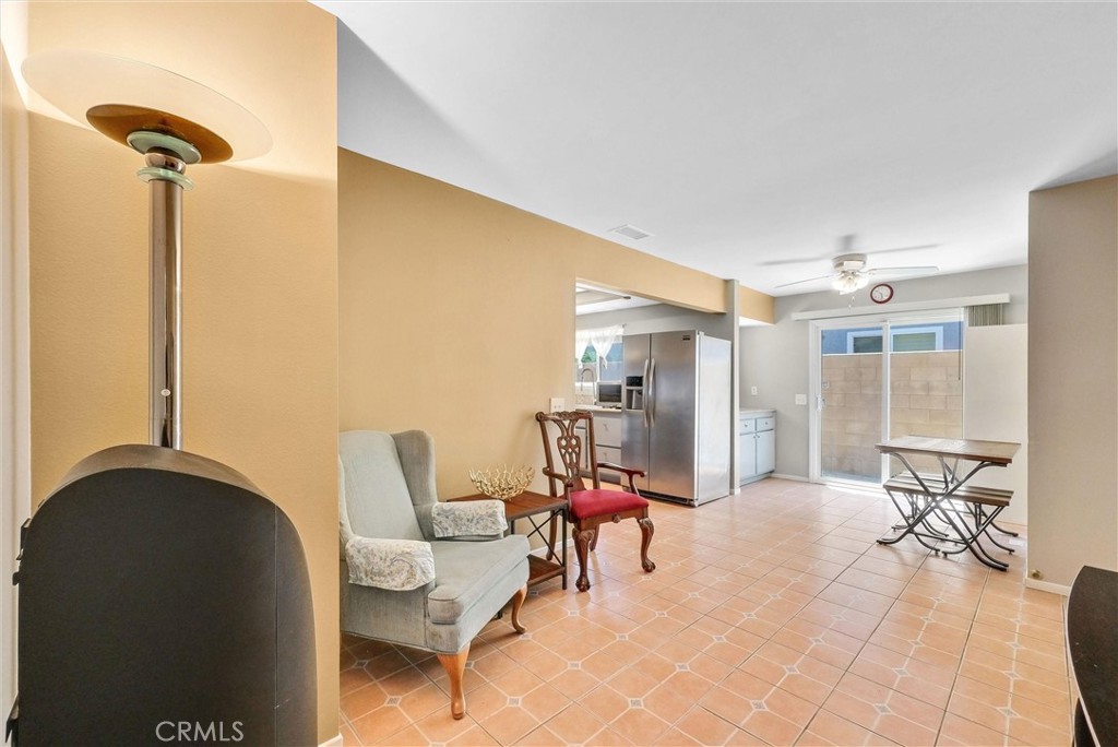 3415 Siskiyou Circle Riverside, CA 92503 - Photo 13 of 41 a living room with furniture and a chandelier