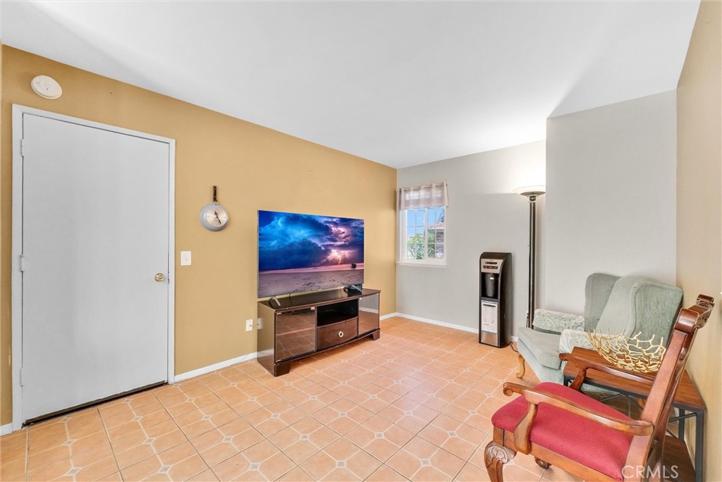 3415 Siskiyou Circle Riverside, CA 92503 - Photo 14 of 41 a living room with furniture and a flat screen tv