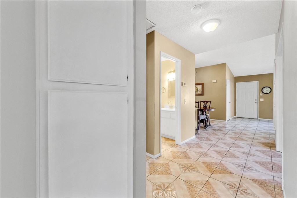 3415 Siskiyou Circle Riverside, CA 92503 - Photo 18 of 41 a view of a hallway with a furniture